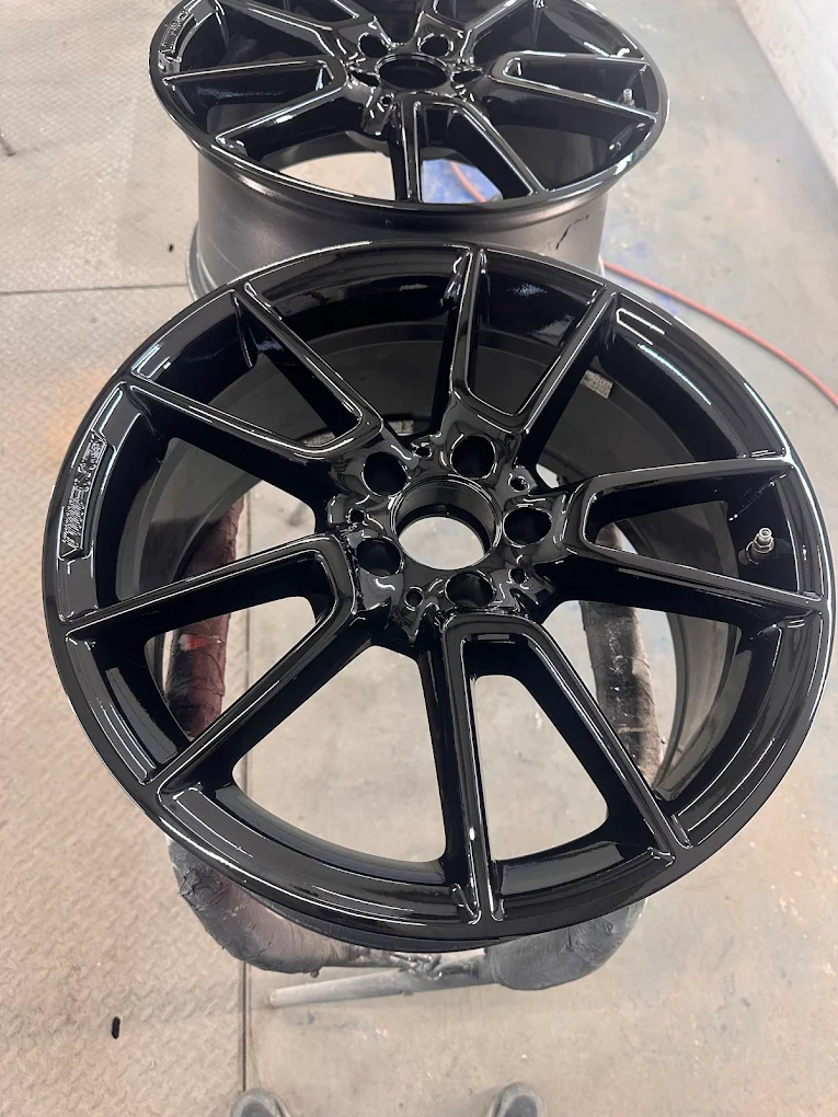 Fully refurbished alloy wheel with smooth finish after repair in Burton-on-Trent