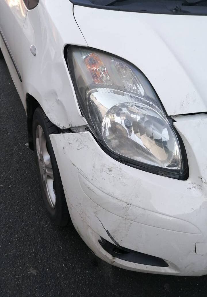 Dent on front driver-side wing before repair at Dent Dynamics Burton-on-Trent