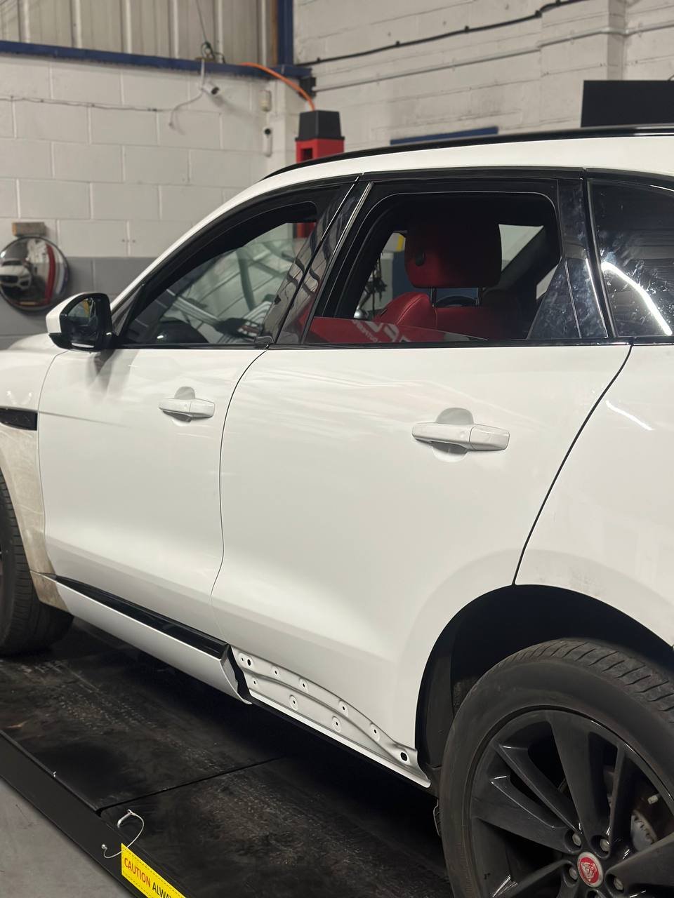 Restored rear left door with flawless paint finish after repair in Burton-on-Trent