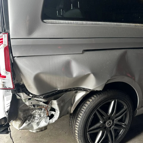 Accident damage rear quarter panel before car body repair Burton-on-Trent