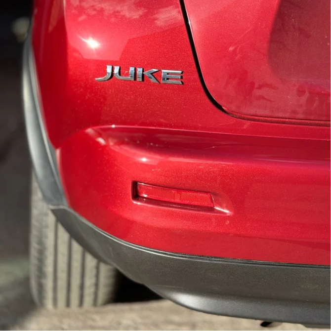 Bumper repair Burton-on-Trent – repaired rear bumper on red Nissan Juke